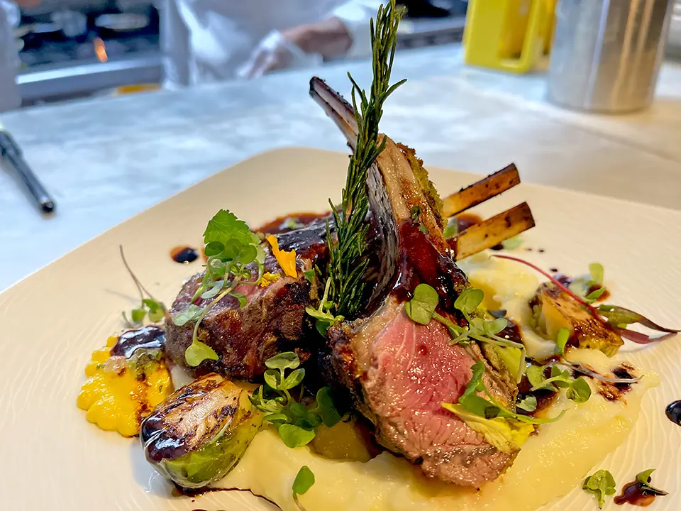 Grilled rack of lamb entrée during happy hours at The Walnut Tavern Bar & Grill Skiplyn Berkeley CA 94709