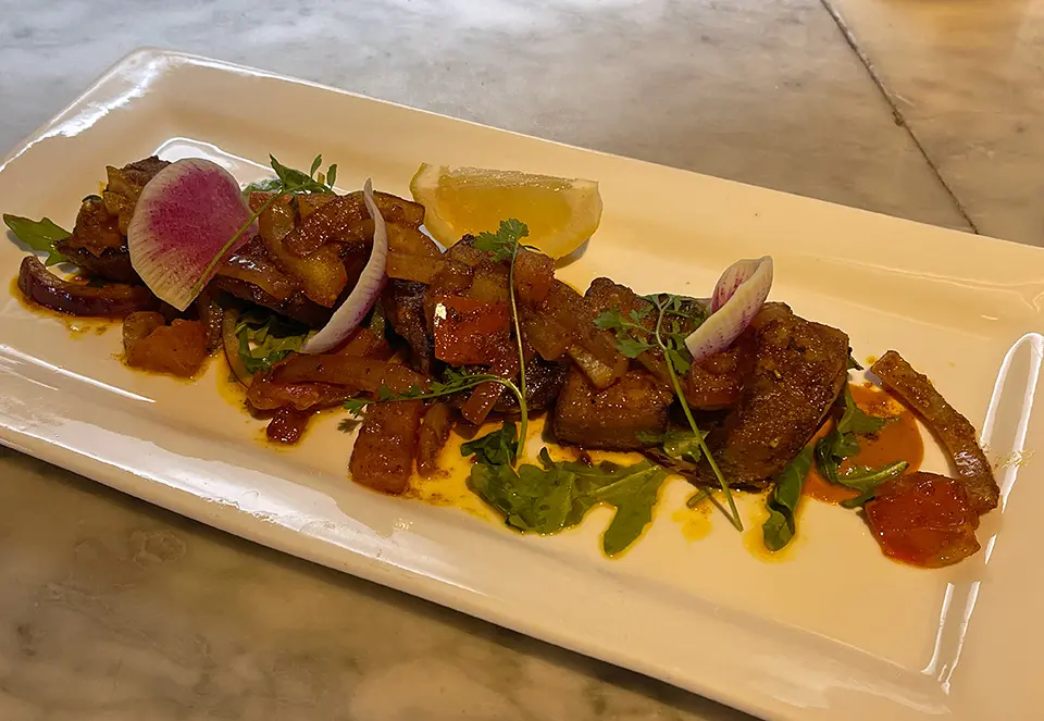 Pork belly entrée at The Walnut Tavern Bar & Grill, American restaurant located at 1508 Walnut St, Berkeley CA 94709.