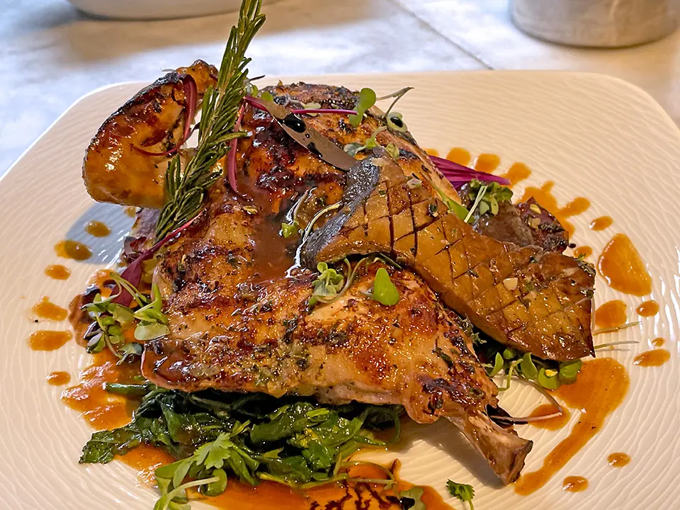 Roasted herb-marinated half-chicken entrée from The Walnut Tavern Bar & Grill, Berkeley, CA 94709